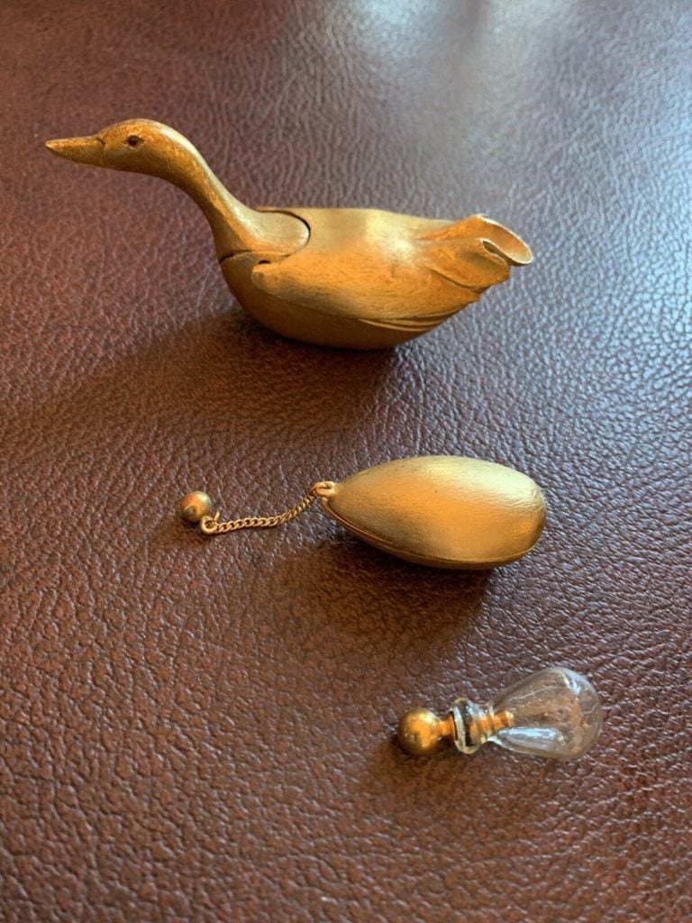 1940’s Mosell gold-toned goose with gold egg and mini perfume bottle