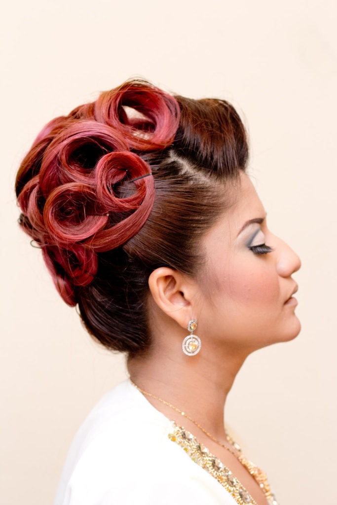 Sort of the drastic version of the Swirled Fringe (below), this style is any of a number of elaborate curls and twists all neatly pinned against the head.