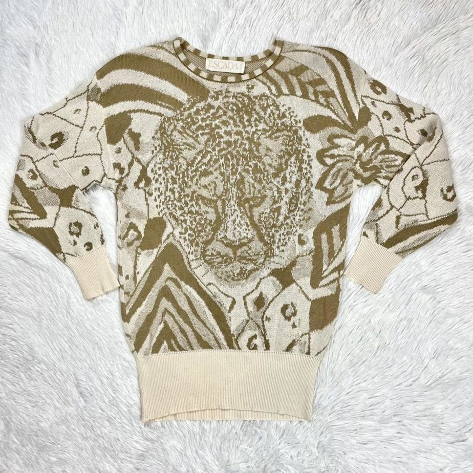 Vintage 80s big cat sweater from Escada featuring a knit cheetah over a geometric pattern